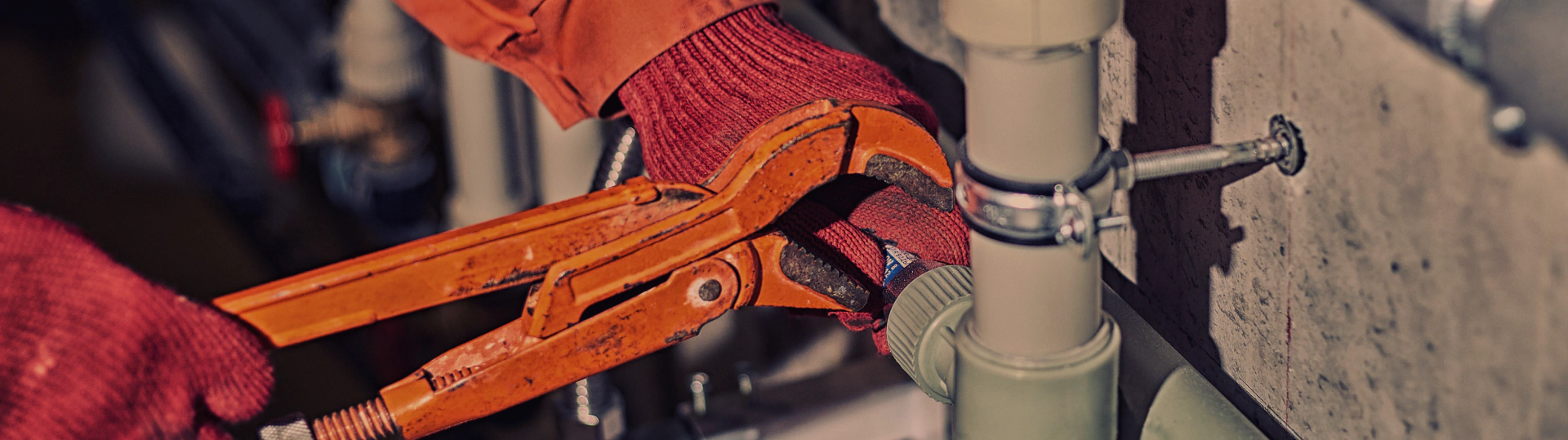 man using a wrench